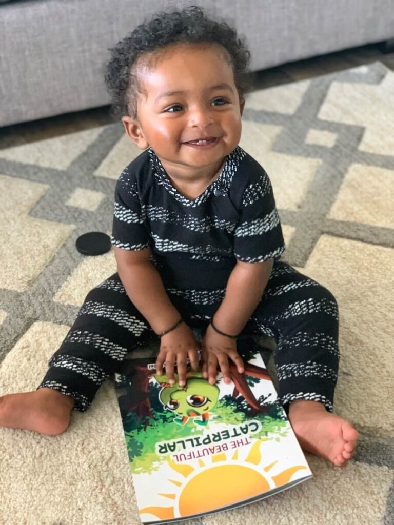 Baby with Beautiful Catepillar Book