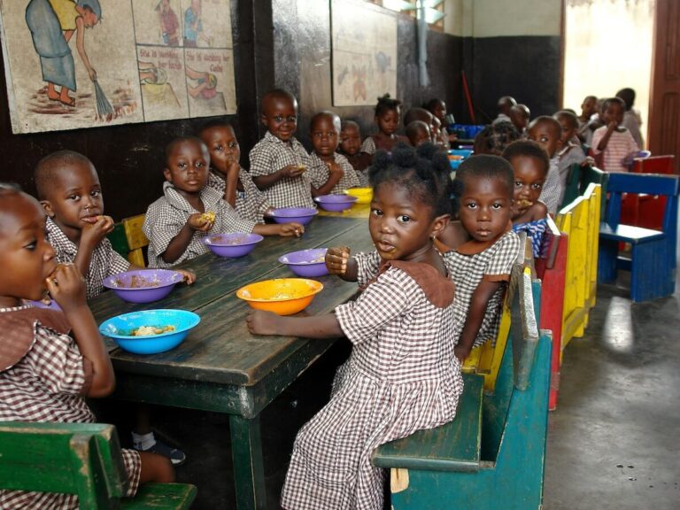 School Sponsor Feeding Children Event